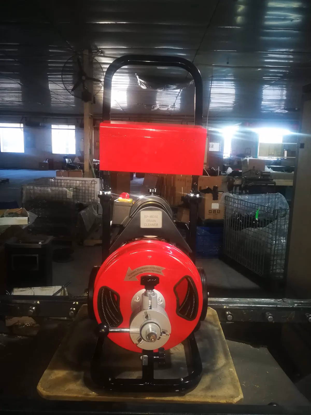 SP-MD50 Compact Electric Drain Cleaning Machine SP-MD50 drain cleaner machine with branded label on THAIMAKE production line, Chonburi Thailand